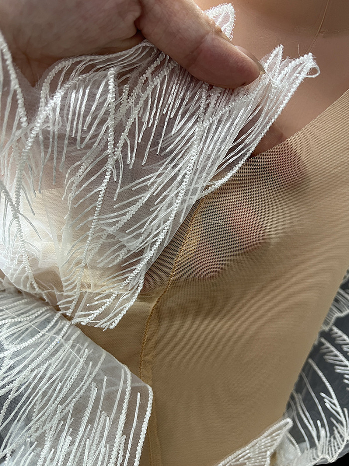 Ethereal Mini Dress With Sheer Wings Texture And Crystal Embellishments - White