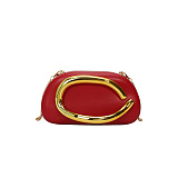 Clutch With Gold Sculptural Handle