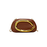 Clutch With Gold Sculptural Handle