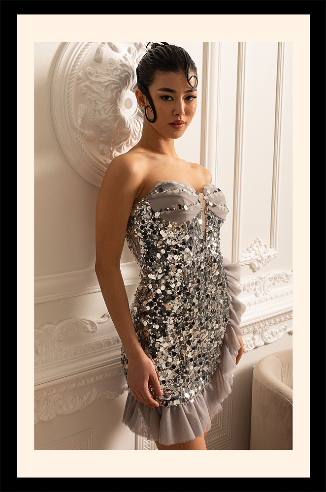 Strapless Sequin Mini Dress With Ruffled Hem And Side Slit - Silver