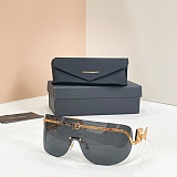 Statement Sunglasses in Black and gold