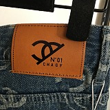 Chanel All-Over Logo Wide-Leg Jeans
