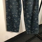 Chanel All-Over Logo Wide-Leg Jeans