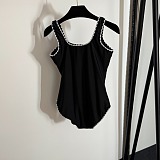 Chanel Chic Black Ribbed One-Piece Swimsuit with White Scalloped Edges
