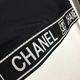 Chanel Luxury Monochromatic Cropped Sports Bra & Leggings Set with Signature Branding