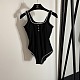 Chanel Chic Black Ribbed One-Piece Swimsuit with White Scalloped Edges