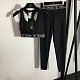 Chanel Luxury Monochromatic Cropped Sports Bra & Leggings Set with Signature Branding