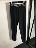 Chanel Luxury Monochromatic Cropped Sports Bra & Leggings Set with Signature Branding