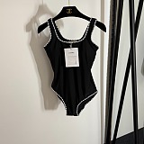 Chanel Chic Black Ribbed One-Piece Swimsuit with White Scalloped Edges