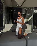 Chanel Luxury White Embossed CC Logo One-Piece with Ruffle Trim