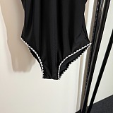Chanel Chic Black Ribbed One-Piece Swimsuit with White Scalloped Edges