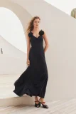 Chanel Leather Mules in Black(The CHANEL Coco Beach 2026 collection Look 36)