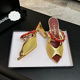 Chanel Leather Mules in Gold(The CHANEL Coco Beach 2026 collection Look 18)