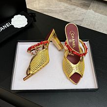 Chanel Leather Mules in Gold(The CHANEL Coco Beach 2026 collection Look 18)