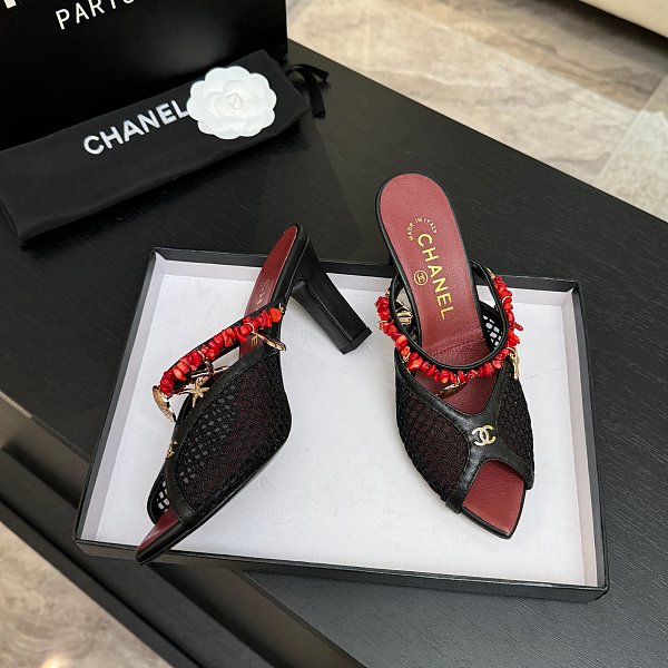 Chanel Leather Mules in Black(The CHANEL Coco Beach 2026 collection Look 36)