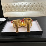 Chanel Leather Mules in Gold(The CHANEL Coco Beach 2026 collection Look 18)