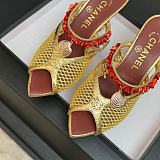 Chanel Leather Mules in Gold(The CHANEL Coco Beach 2026 collection Look 18)