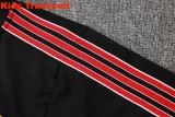Kids MUFC 25/26 Retro Training Jacket and Pants Set E2514