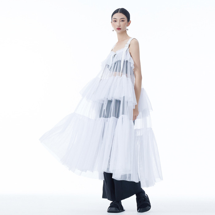 Net fabric see-through design blouse with cake-style shoulder straps and a long skirt. Summer new style, fashionable and unique dress. DLZLYQ0