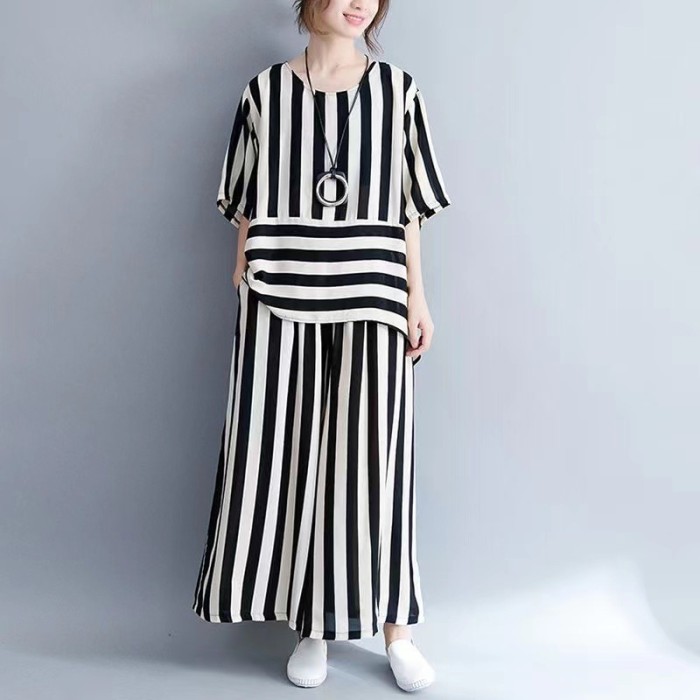 New large-sized artistic vertical stripe fashion irregular hemmed top + flared pants set DLZQ90401