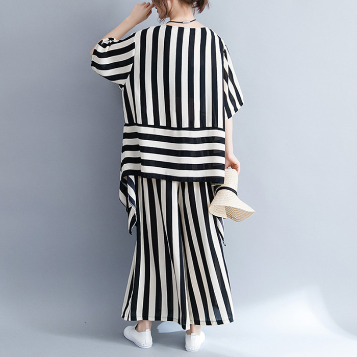 New large-sized artistic vertical stripe fashion irregular hemmed top + flared pants set DLZQ90401