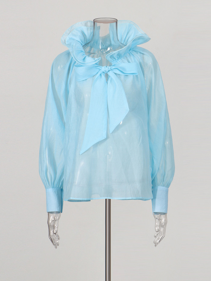 New style blouse with ruffled collar and strap, long sleeves and net fabric, featuring a stylish design.  DLZS4280