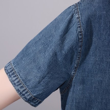 Long women's plus-size denim dress with a relaxed fit and a light grey color, featuring a smart and elegant short-sleeved design.  DLZQ1205