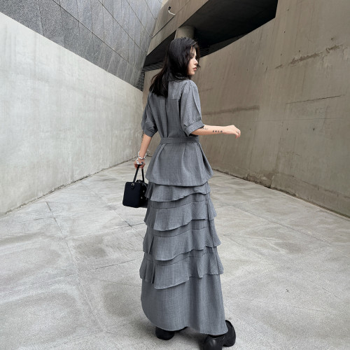 A waist-shrinking short-sleeved top paired with a layered cake-style long skirt set  DLZTZ26050
