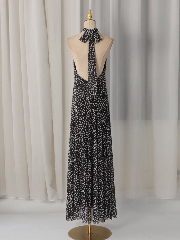 Floral-patterned beach dress with a high waist and a neck strap, exuding a strong sense of atmosphere. DLZcq52201