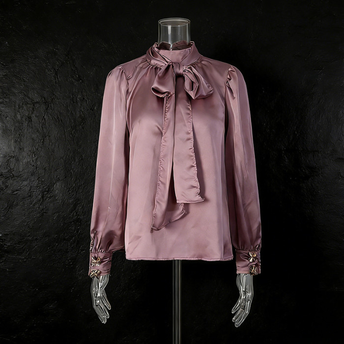 New style button-down shirt with bowknot decoration and pleated cuffs, in a loose fit.  DLZcs60514