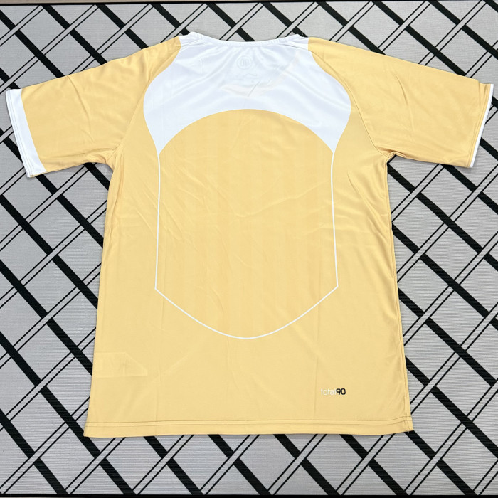 Total 90 Gold Retro-style soccer jersey
