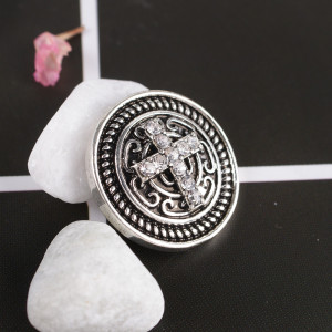 snaps cross metal chunks with rhinestones