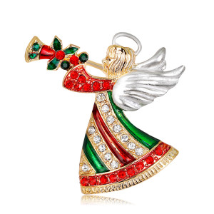 Christmas brooch with angel blowing trumpet