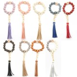 Leopard pattern wood bead bracelet beaded spot wood bead bracelet PU leather tassel bracelet key chain