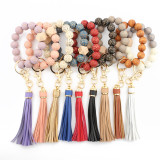 Leopard pattern wood bead bracelet beaded spot wood bead bracelet PU leather tassel bracelet key chain