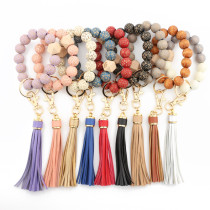 Leopard pattern wood bead bracelet beaded spot wood bead bracelet PU leather tassel bracelet key chain