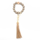 Leopard pattern wood bead bracelet beaded spot wood bead bracelet PU leather tassel bracelet key chain
