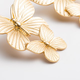 Two butterfly alloy earrings