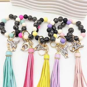 Printed wooden cow head sesame spotted wood bead PU tassel bracelet keychain