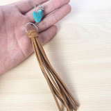 Long turquoise tassel leather earrings
