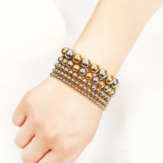 Stainless steel Real gold plating  ball elastic bracelet