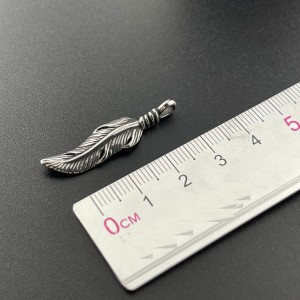 Stainless steel feather pendant