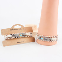 Handwoven feather leather bracelet