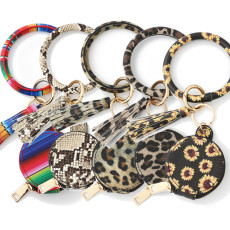Bluetooth earphone bag PU leather bracelet keychain makeup bag with mirror circular wrist bag