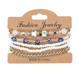 Bohemian Eye Pattern Rice Beads Multi layered Bracelet