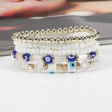 Bohemian Eye Pattern Rice Beads Multi layered Bracelet