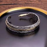 Vintage alloy feather bracelet with adjustable opening size