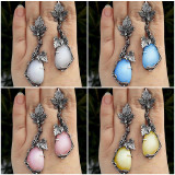 Metal grapevine leaf earrings with water droplet shaped cat's eye stone earrings