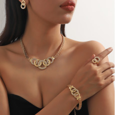Five piece set of fashionable and gorgeous rhinestones with crossed circular necklaces, earrings, bracelets, and rings