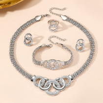 Five piece set of fashionable and gorgeous rhinestones with crossed circular necklaces, earrings, bracelets, and rings